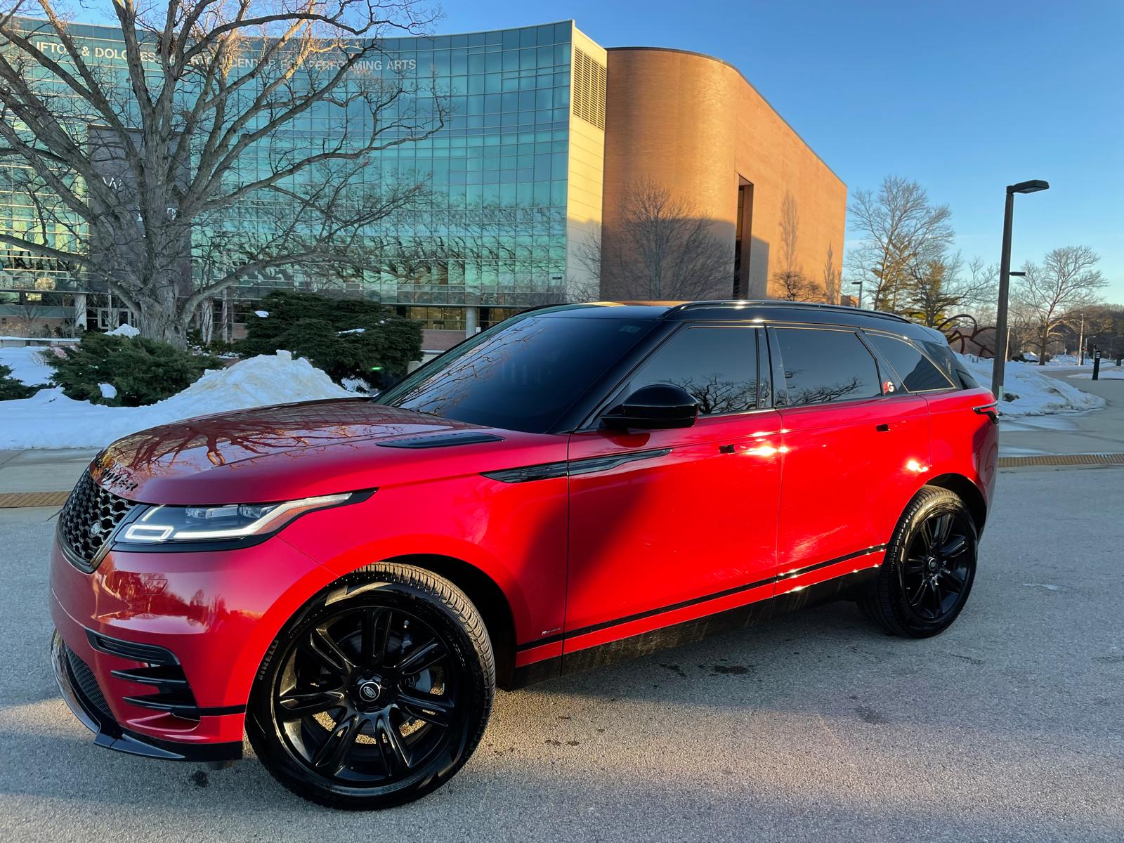 Red Range Rover Velar R-Dynamic detailed with glossy paint and black wheels