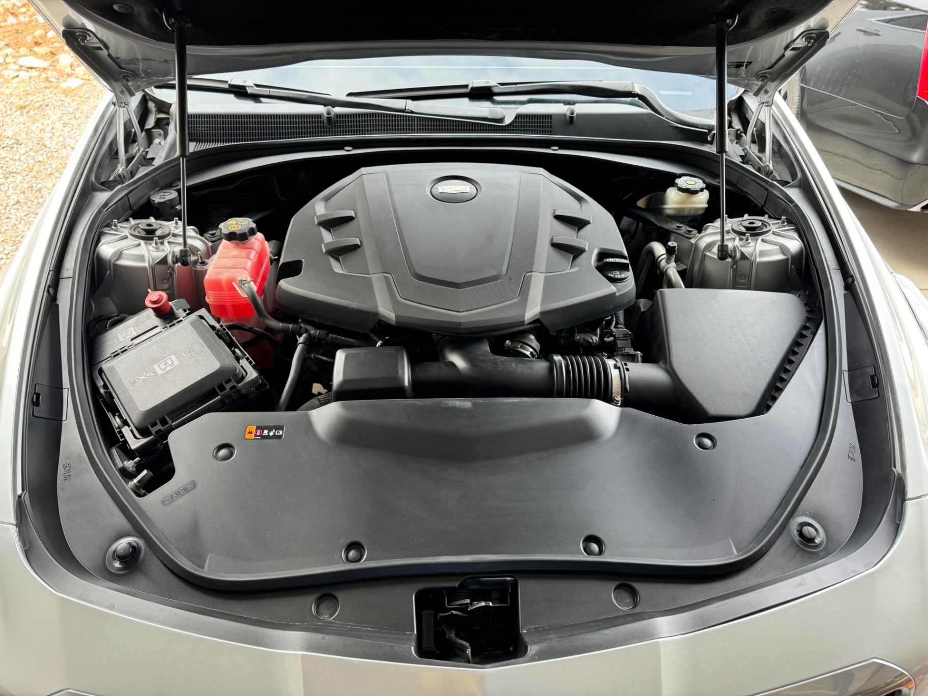 Cadillac engine bay cleaned and dressed