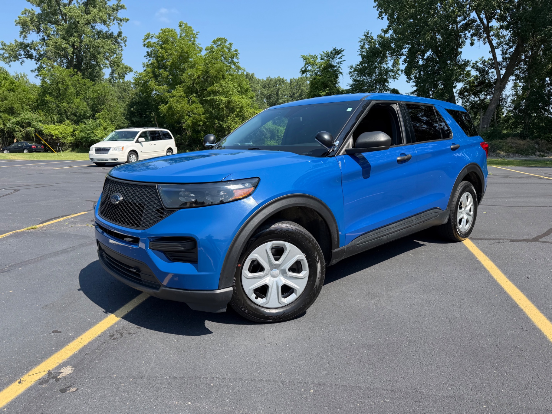 Blue Ford Explorer detailed exterior side profile