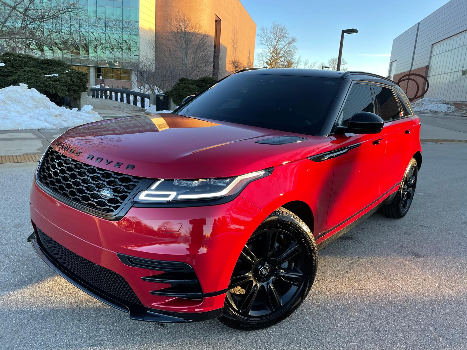 Red Range Rover Velar front view detailed to a mirror finish