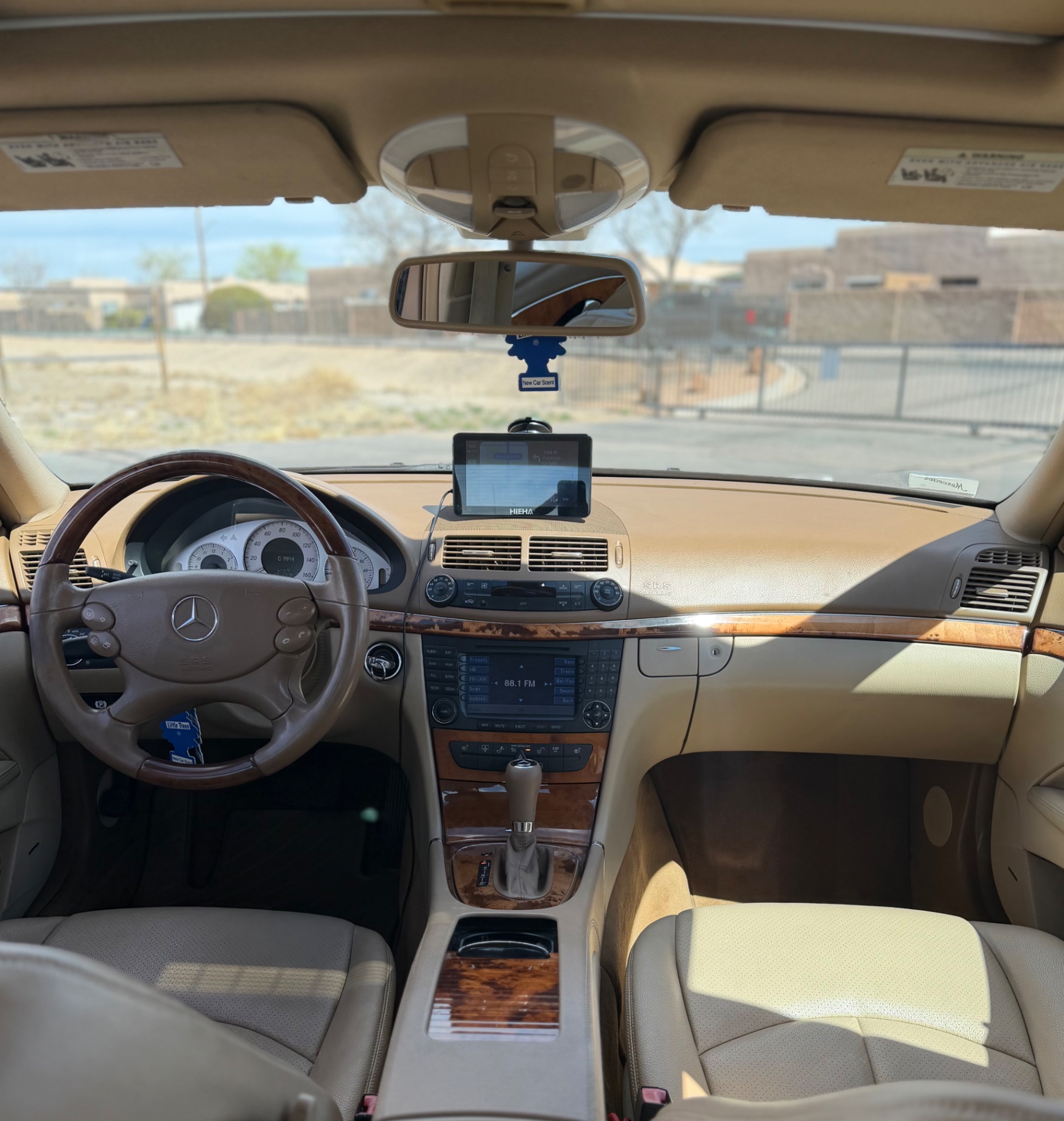 Mercedes-Benz E-Class tan interior dashboard detailed